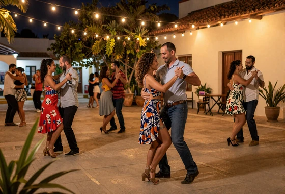 Dominican couple dancing bachata at an outdoor evening gathering in Santo Domingo - Dominican dating culture
